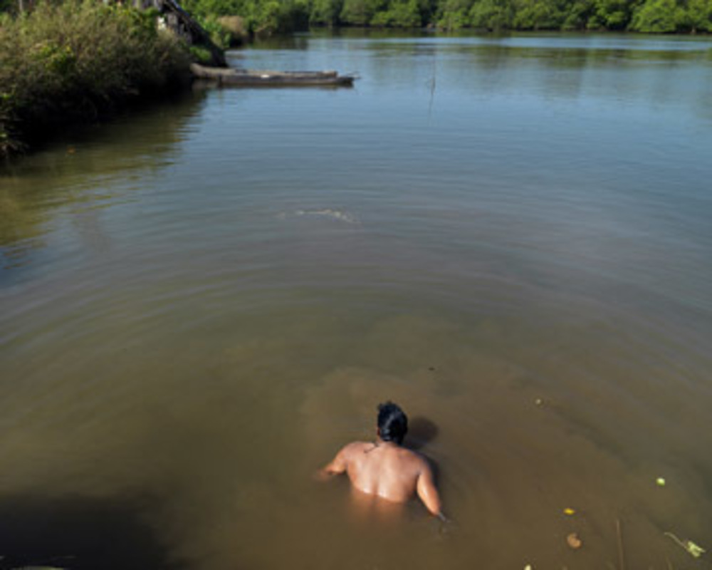 Man In Pond
